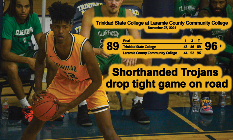 Shorthanded Trojans drop tight game on road