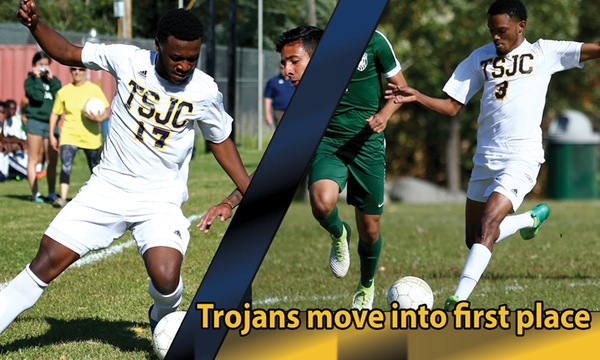 Trojans move into first place